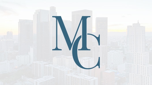 Matthew Cargal logo over cityscape image